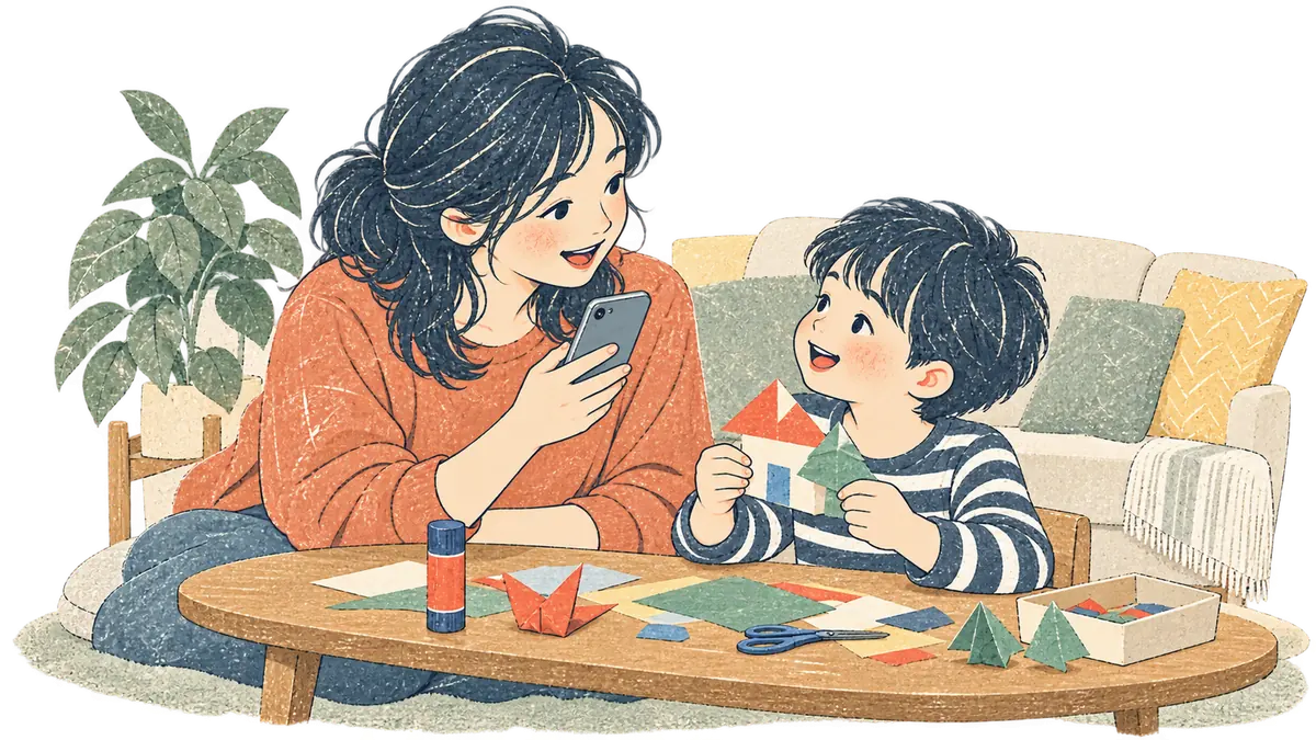 家のリビングで、保護者がお子さまの話を聞きながら、スマートフォンで様子を記録している